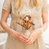 Silver Poppy stem urn style capsule