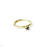 gold bud diamond ring on white background