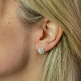 ear modelling silver buttercup stud earrings