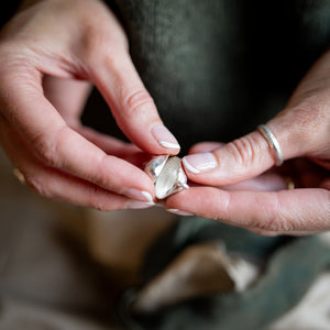 Clam Shell Capsule Memory Bangle