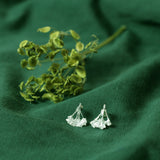  cow parsley silver earrings on green cloth with dried flowers