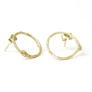 Gold Twig Circle Stud Earrings on white background