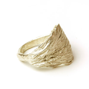 gold artichoke leaf ring on white background