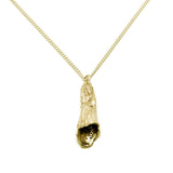 gold foxglove pendant necklace on white background