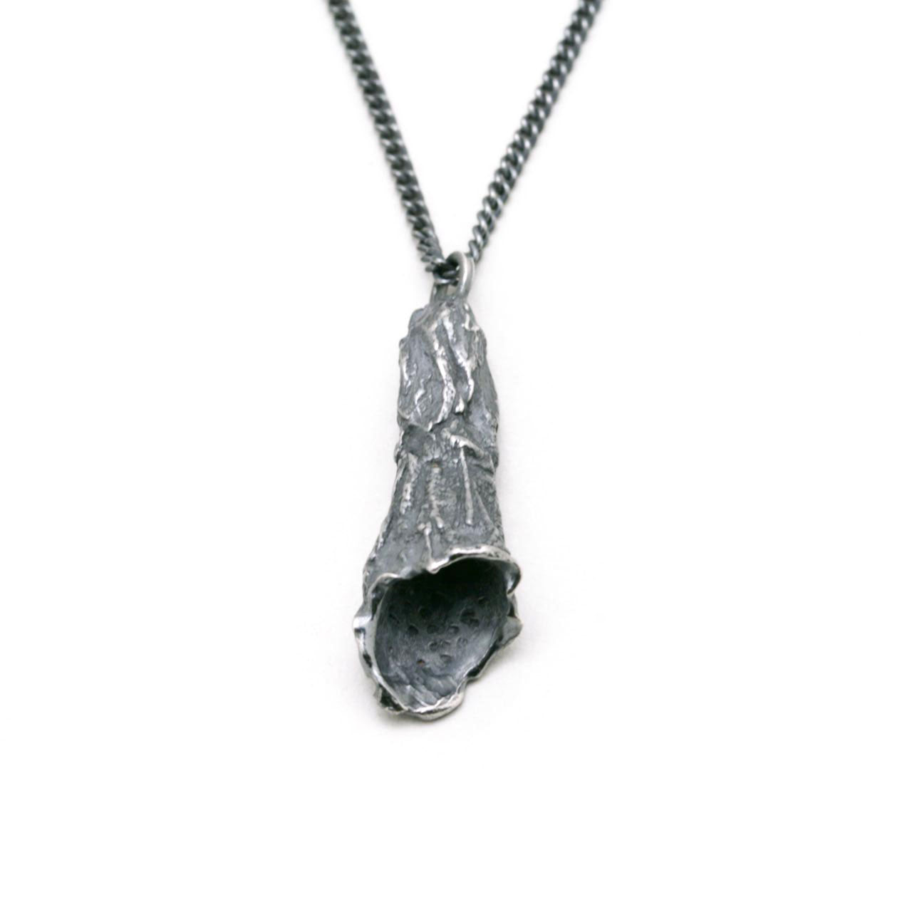 oxidised foxglove pendant necklace on white background