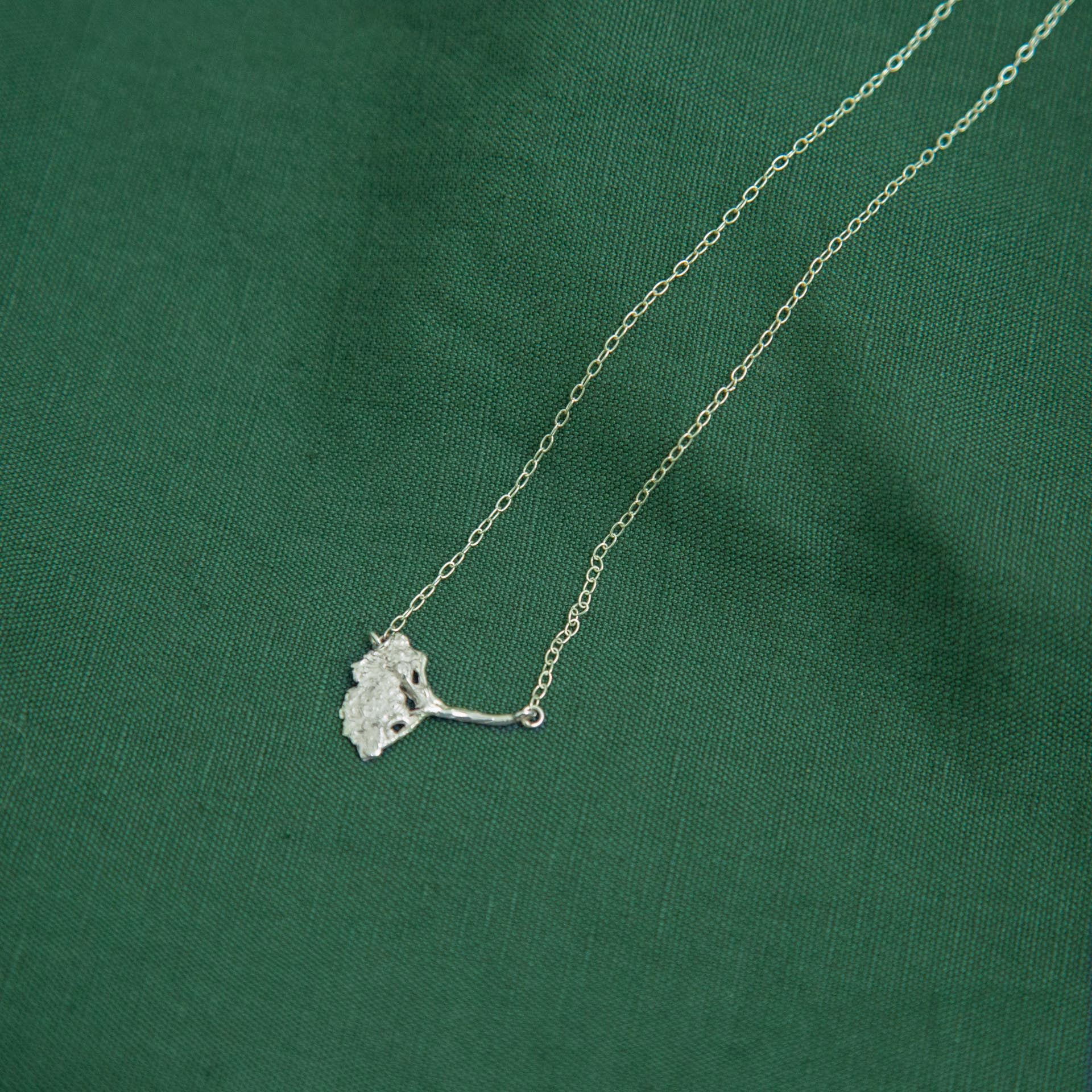  cow parsley silver necklace on green cloth