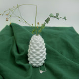 cow parsley silver necklace on a white flower pot with green cloth and dried flowers