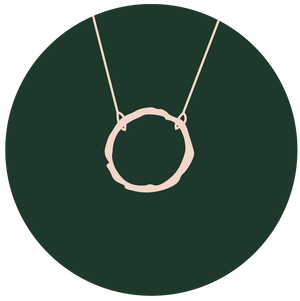 illustration of single eternity necklace on green circle background