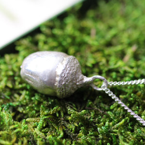 Large acorn necklace cast in silver or gold deisgne dto hold ashes sealed forever from the memory and memorial collection by Cast & Found jewelry