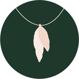 illustration of two leaf pendant on green circle background